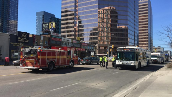 Emergency responders are seen near the site where a van struck pedestrians in Toronto, Canada, April 23, 2018. A white van struck multiple pedestrians in Toronto's northern suburbs on Monday and police have taken the driver into custody, police said on Twitter. (Xinhua/Zou Zheng)