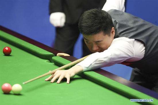 Ding Junhui of China competes during the first round match against Xiao Guodong of China at the World Snooker Championship 2018 at the Crucible Theatre in Sheffield, Britain, on April 23, 2018. (Xinhua/Han Yan)
