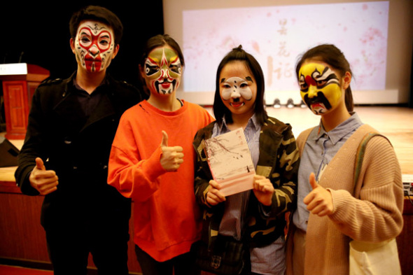 Students of the Capital Normal University in Beijing have a facial make-up of Kunqu Opera. (Photo: China Daily/Du Lianyi)