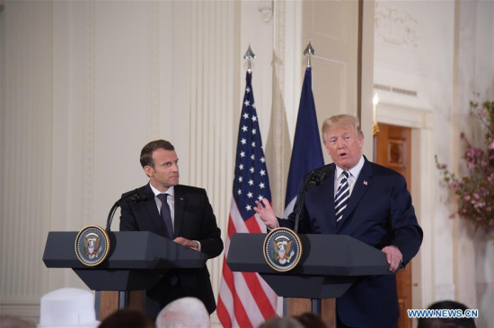 U.S. President Donald Trump (R) and French President Emmanuel Macron attend a joint press conference at the White House in Washington D.C., the United States, April 24, 2018. Macron is on a state visit to the United States from Monday to Wednesday. (Xinhua/Yang Chenglin)