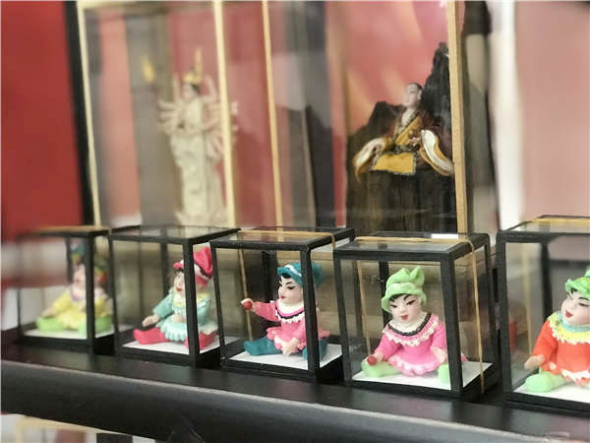 Dough figurines are showcased during the show.(Photo provided to chinadaily.com.cn)