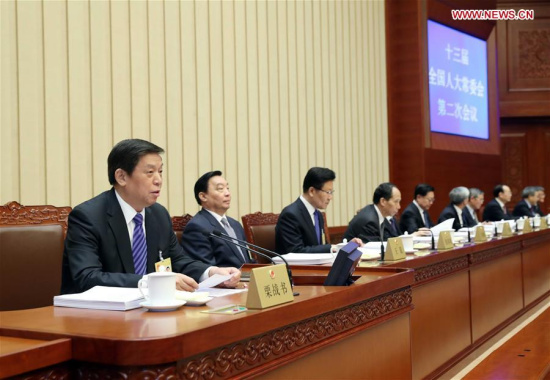 Li Zhanshu, chairman of the National People's Congress (NPC) Standing Committee, presides over a bimonthly legislative session of the NPC Standing Committee at the Great Hall of the People in Beijing, capital of China, April 25, 2018. (Xinhua/Liu Weibing)
