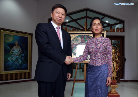 Visiting head of the International Department of the Communist Party of China (CPC) Central Committee Song Tao (L) shakes hands with Myanmar State Counselor Aung San Suu Kyi during their meeting in Nay Pyi Taw, Myanmar, on April 25, 2018. (Xinhua/U Aung)