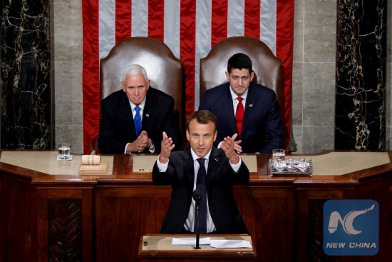 U.S. Vice President Mike Pence (L, Rear) and House Speaker Paul Ryan (R, Rear) listen as French President Emmanuel Macron (Front) addresses a joint session of the U.S. Congress in Washington D.C., the United States, on April 25, 2018. (Xinhua/Ting Shen)