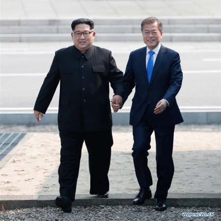 South Korean President Moon Jae-in (R) meets with top leader of the Democratic People's Republic of Korea (DPRK) Kim Jong Un in the border village of Panmunjom on April, 27, 2018. Moon Jae-in arrived Friday morning in the border village of Panmunjom for his first summit with Kim Jong Un. (Xinhua/Inter-Korean Summit Press Corps)