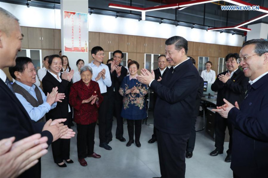 Chinese President Xi Jinping, also general secretary of the Communist Party of China (CPC) Central Committee and chairman of the Central Military Commission, visits Qingheju, a modern community developed from a former shanty town, in Qingshan District in Wuhan, capital of central China's Hubei Province, April 26, 2018. Xi made an inspection tour in Hubei Province from Tuesday to Saturday. (Xinhua/Xie Huanchi)