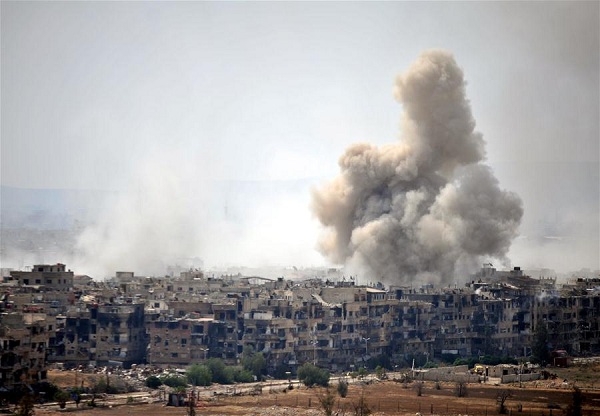 Photo taken on April 29, 2018 shows smoke rising from the Islamic State militant's positions in the Hajar al-Aswad neighbourhood, south of Damascus, Syria. The Syrian army captured the IS-controlled areas in al-Qadam on Saturday, according to the state news agency SANA. (Xinhua/Ammar Safarjalani)