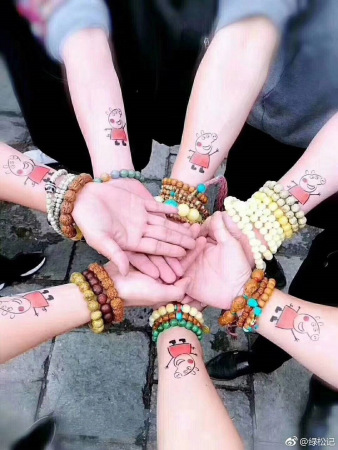 Peppa mania has led to adults showing off their Peppa Pig merchandise and tattoos on social media platforms. (Photo provided to China Daily)