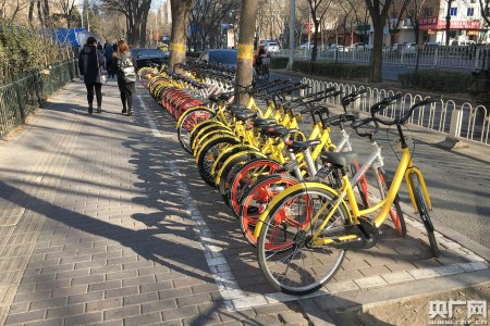 cities use technology and reward systems to help shared-bike users create better habits