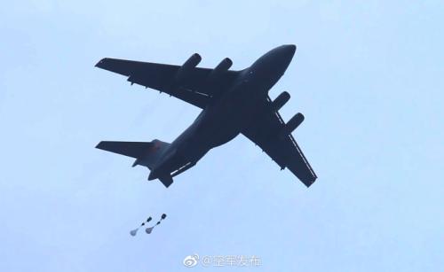 Y-20 heavy transport aircraft conducts first airborne, air delivery training