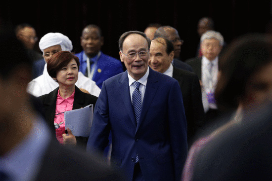 Vice-President Wang Qishan attends the Third Forum on China-Africa Local Government Cooperation in Beijing on Tuesday. About 400 people were attracted to the forum. (WANG ZHUANGFEI/CHINA DAILY)
