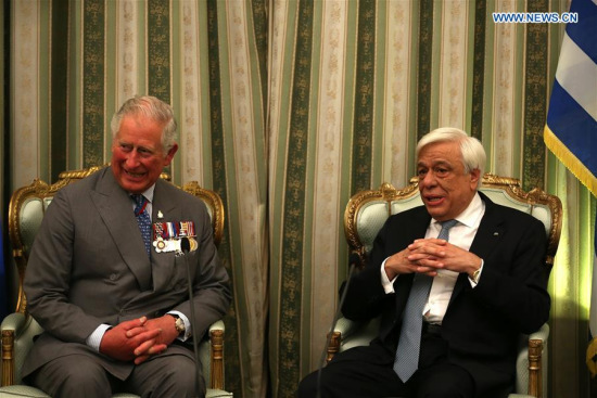 Britain's Prince Charles (L) and Greek President Prokopis Pavlopoulos talk during their meeting at the presidential office, in Athens, Greece, on May 9, 2018. Britain's Prince Charles and his wife Camilla, Duchess of Cornwall are on an official visit of three days in Greece. (Xinhua/Marios Lolos)