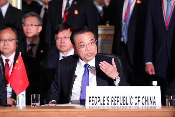 Premier Li Keqiang attends at their trilateral summit with Japan's Prime Minister Shinzo Abe and South Korea's President Moon Jae-in (not in picture) at Akasaka Palace state guest house in Tokyo, May 9, 2018. (Photo provided to China Daily)