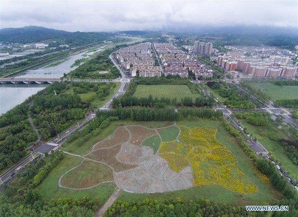 Aerial photo taken by drone shows the new Beichuan county, Southwest China's Sichuan province, May 10, 2018. Beichuan was one of the worst-hit areas when a catastrophic earthquake struck Sichuan's Wenchuan county on May 12, 2008. Beichuan county later was rebuilt in a new location. Now about 35,000 people live in the new county. (Photo/Xinhua)