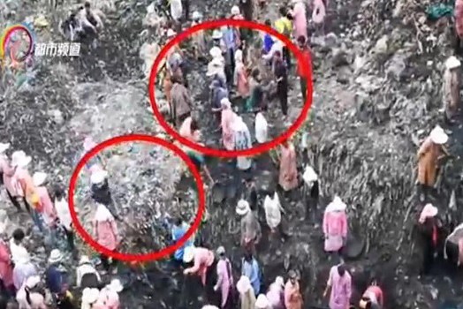 Yunnan TV, which broke the story on the incident on Thursday, said every time the local anti-smuggling office has buried such smuggled food in landfills in the past two years or so, villagers have dug it up. (Photo/yntv.cn)