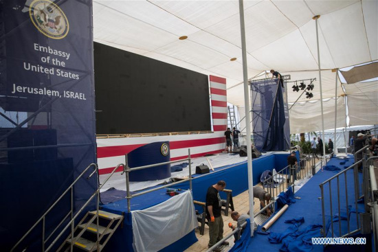 Workers prepare the stage for the opening ceremony of the new U.S. embassy in Jerusalem on May 13, 2018. Israel prepares on Sunday for the opening ceremony of the new U.S. embassy in Jerusalem on Monday, a move that has sparked Palestinian protests. (Xinhua/JINI)