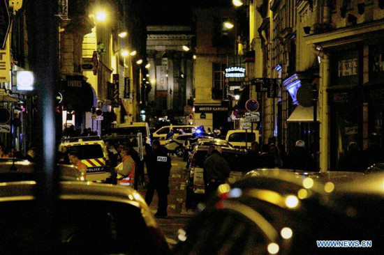 Police officers cordon off the site where a knife attack happened in Paris, France, May 12, 2018. (Xinhua/Han Bing)