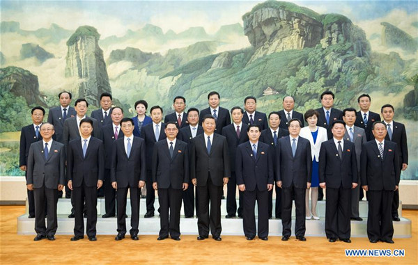 Xi meets DPRK's WPK friendship visiting group
