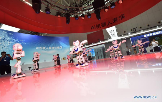 Photo taken on May 16, 2018 shows a robot show during the 2nd World Intelligence Congress in Tianjin, north China. Over 1,800 artificial intelligence experts from 17 countries and regions participated in the congress that kicked off on Wednesday. (Xinhua/Li Ran)