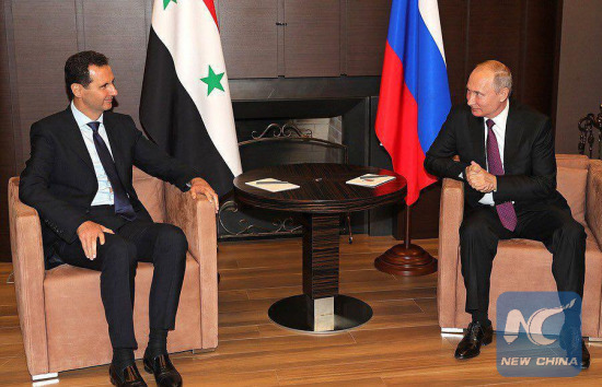 Syrian President Bashar al-Assad (L) met with Russian President Vladimir Putin (R) in Russia's city of Sochi on May 17. (Syrian presidential media office)