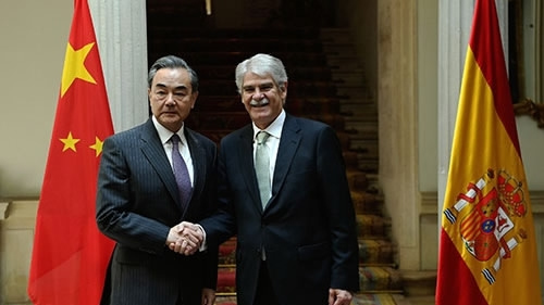Chinese State Counselor and Foreign Minister Wang Yi shakes hands with his Spanish counterpart Alfonso Dastis in Madrid, Spain, May 17, 2018. /MOFA Photo Chinese State Counselor and Foreign Minister Wang Yi shakes hands with his Spanish counterpart Alfonso Dastis in Madrid, Spain, May 17, 2018. /MOFA Photo