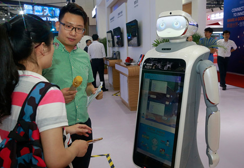 An intelligent robot made by China Telecommunications Corp is on show at the Second World Intelligence Congress in Tianjin. (Photo by Jia Chenglong/For China Daily)