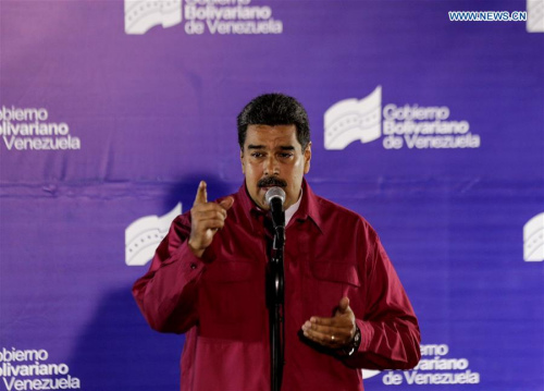 Venezuelan President Nicolas Maduro delivers a speech during a press conference after casting his vote in a polling center in Caracas, Venezuela, on May 20, 2018. Nicolas Maduro was reelected for a second six-year term in the presidential election on Sunday, according to the National Electoral Council. (Xinhua/Boris Vergara)