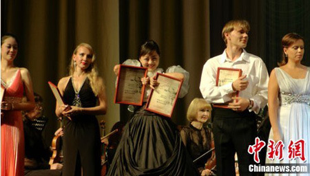 Sun Qing (middle) won third prize in a competition held in Russia this year.