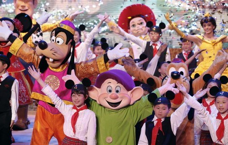 A performance during the groundbreaking ceremony for the Walt Disney Co Shanghai Disney Resort last year. The company has entered a partnership with China Animation Group and Tencent Holdings Ltd to promote local content. [Photo / Bloomberg]