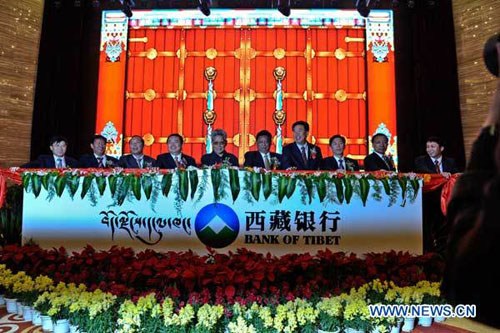 A ceremony is held to celebrate the opening of the Bank of Tibet in Lhasa, capital of southwest China's Tibet Autonomous Region, May 22, 2012. (Xinhua/Purbu Zhaxi) 