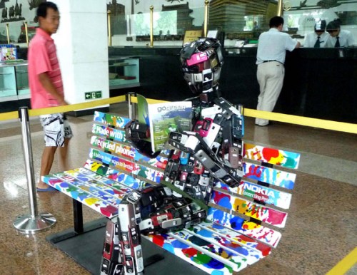 A robot model made from hundreds of used cell phones on display in a post office in Beijing last year.