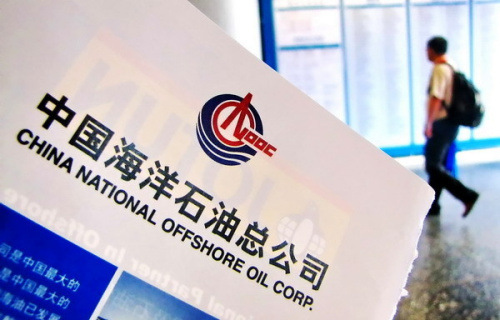 An advertisement for CNOOC Ltd's booth at a trade show in Shanghai in August 2011. The company has only nine years' worth of reserves based on its current production - one of the lowest among global oil majors. [Photo/ China Daily] 