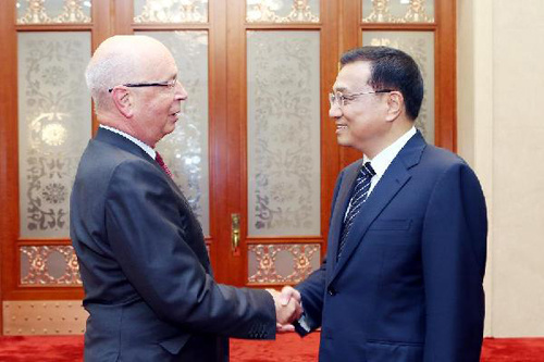 Chinese Vice Premier Li Keqiang (R) meets with Klaus Schwab, executive chairman of the World Economic Forum, and members of the International Business Council, in Beijing, capital of China, Sept. 10, 2012. (Xinhua/Yao Dawei)