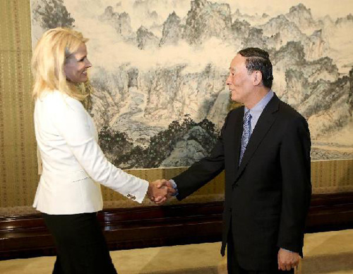 Chinese Vice Premier Wang Qishan (R) meets with Danish Prime Minister Helle Thorning-Schmidt in Beijing, capital of China, Sept. 10, 2012. (Xinhua/Ding Lin)