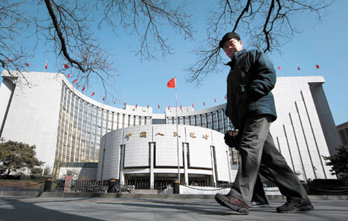 The headquarters of the People's Bank of China in Beijing. Data released by the PBOC showed more loans were extended to the real estate sector from July to September than during the second quarter of the year. [Photo/Agencies]