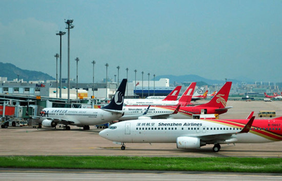 Airplanes taxi at Shenzhen Bao'an International Airport in 2011. Zhang Bin / for China Daily