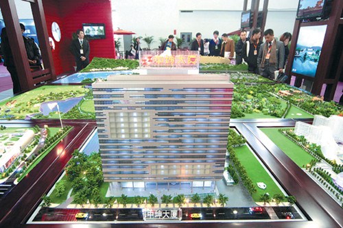 A model of Zhongkun Plaza on display at a housing fair in Beijing. The Icelandic government for the second time has rejected Zhongkun Investment Group Co's bid to purchase a plot of land to build a resort in the European country. [Photo by WU CHANGQING / FOR CHINA DAILY]