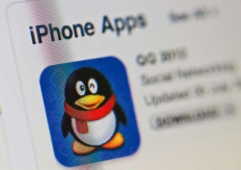 Tencent Holdings Ltd's QQ smartphone app displayed on a laptop computer. Tencent has joined hands with other Internet companies to develop anti-virus services to cope with online security challenges. [Photo/Provided to China Daily] 