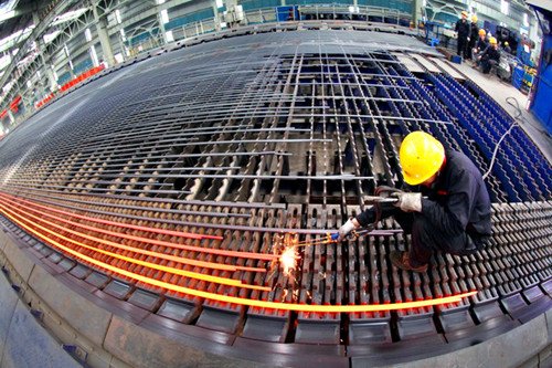 A steel bar factory in Ganyu county, Jiangsu province. In the first 11 months of 2012, China's 80 major steel makers posted a loss of 1.97 billion yuan ($316 million), according to the China Iron and Steel Association. [Photo / China Daily]