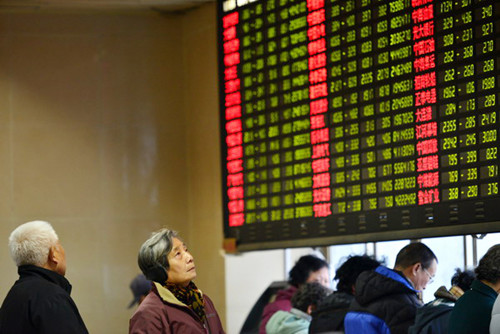 The Shanghai Composite Index dropped by 1.4 percent to 2,293.34 on Tuesday, closing at its lowest level in about a month. [Photo/China Daily]