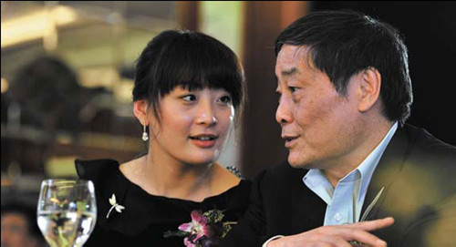 Zong Fuli, the daughter of Zong Qinghou, chairman of Hangzhou Wahaha Group Co Ltd and the richest man on the mainland, attends a ceremony with her father in Hangzhou, Zhejiang. [Photo/China Daily]