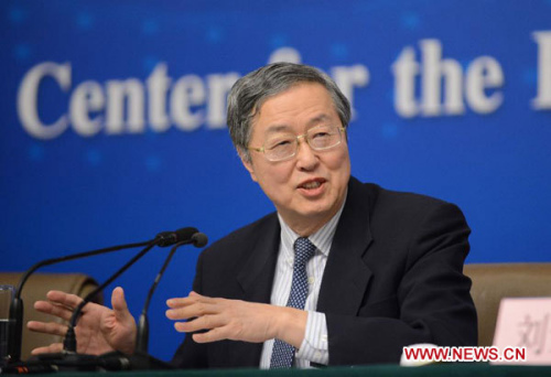 Zhou Xiaochuan, China's central bank governor, speaks at a news conference on China's currency policy and financial reform held by the first session of the 12th National People's Congress (NPC) in Beijing, capital of China, March 13, 2013. (Xinhua/Qin Qing)