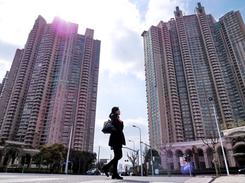 Residential buildings in Shanghai's Pudong New Area. House prices in major cities across the country continued to rise in March after the central government announced new tightening policies and measures. Jing Wei/for China Daily