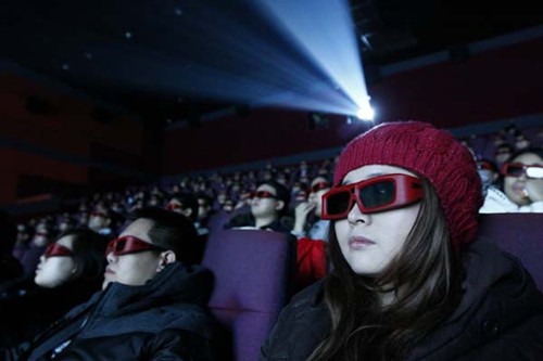 People watching a 3D film at a cinema in Beijing. These days visual effects companies' revenues largely depend on orders from films that have a high-budget for post-production. Provided to China Daily