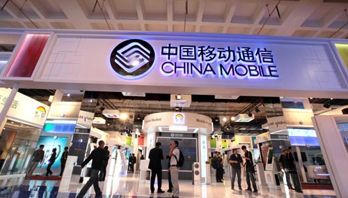 China Mobile Ltd's stand at a telecom exhibition in Beijing. The company's most recent quarterly profit growth is stagnant for the first time in three years. [Da Wei/For China Daily] 