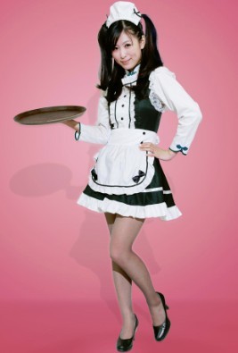 A Spring Airlines stewardess dressed up as a French maid. Spring Airlines, China's only budget air carrier, launched themed flights last month with flight attendants dressed as French maids and butlers. [Photo/Provided to China Daily]
