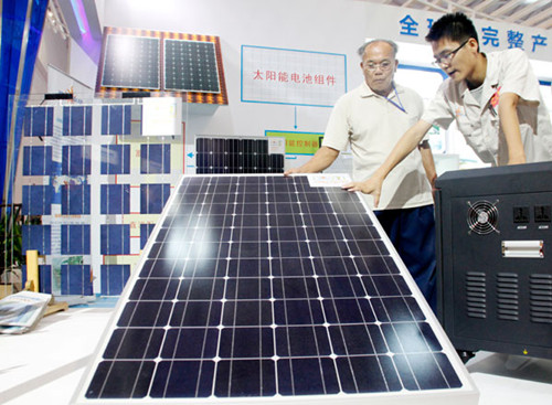 Solar panels on display at an expo in Haikou, Hainan province. A Ministry of Commerce official said the European Commission has been using the solar panel case as a bargaining chip to seek compromise from China in specific sectors, such as telecoms. Shi Yan / For China Daily