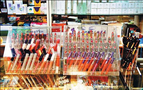 Sales of cheaper cosmetics, such as lipsticks, haven't been affected much by the slowing-down economic growth. L'Oreal Group, for example, saw its market share in China grow 11.2 percent in 2012 from 10.8 percent a year earlier. Li Bin/For China Daily