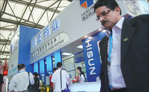 Zhejiang Hisun Pharmaceutical Co's pavilion at a fair in Beijing. By setting up a joint venture with US-based Pfizer Inc in September, Hisun made a breakthrough in China's pharmaceutical industry by taking a controlling stake in the JV with Pfizer, the world's largest drug-maker by sales. [Provided to China Daily