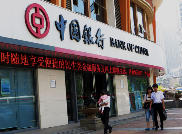 A Bank of China Ltd branch in Yichang,Hubei province. Regulators have curbed banks' lending to other financial institutions such as pawnshops amid a cash crunch. [Photo / China Daily]